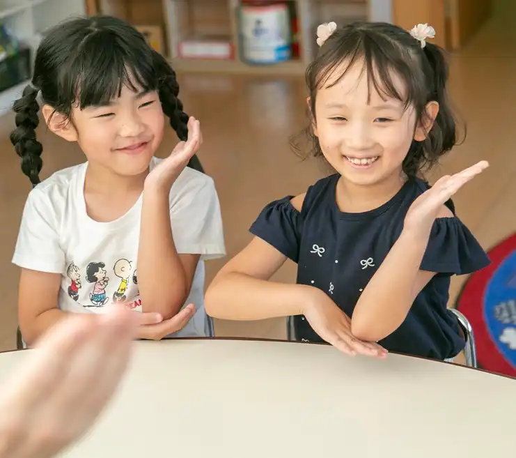 Girls enjoying themselves in lesson
